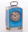 A sub miniature Swiss Art Deco silver guilloche translucent enamel travel clock, circa 1920.